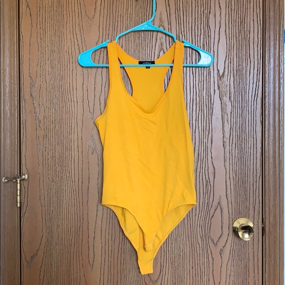 Yellow body suit wore just to try on